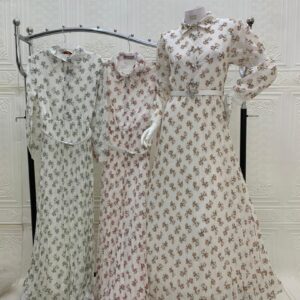 فستان طويل بياقة قميص ونقشة فيونكات بيج ووردي