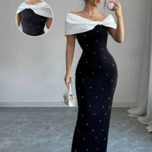 فستان سهرة أنيق باللون الأسود مع ياقة بيضاء لؤلؤية – تصميم ملكي راقٍ
